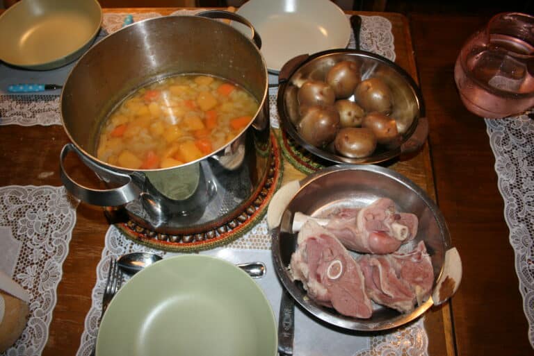 sprengidagur or explosion day in Iceland. A kitchen table is laden with lots of local food and icelandic delicacies